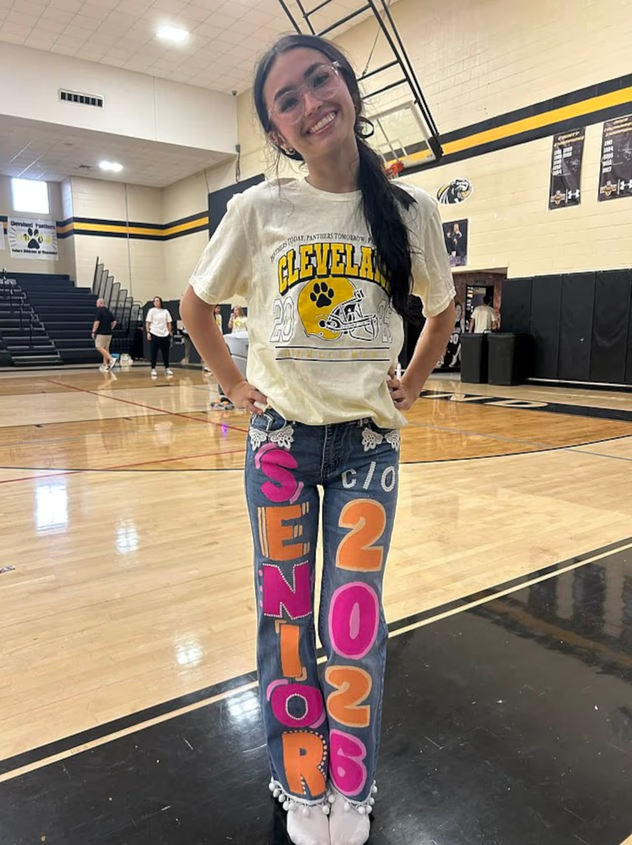 Kimber Mills era porrista de los equipos deportivos de su colegio.