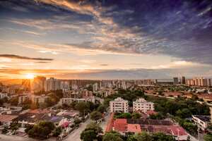 Aerial view of Barranquilla, Colombia towards the river at sunset