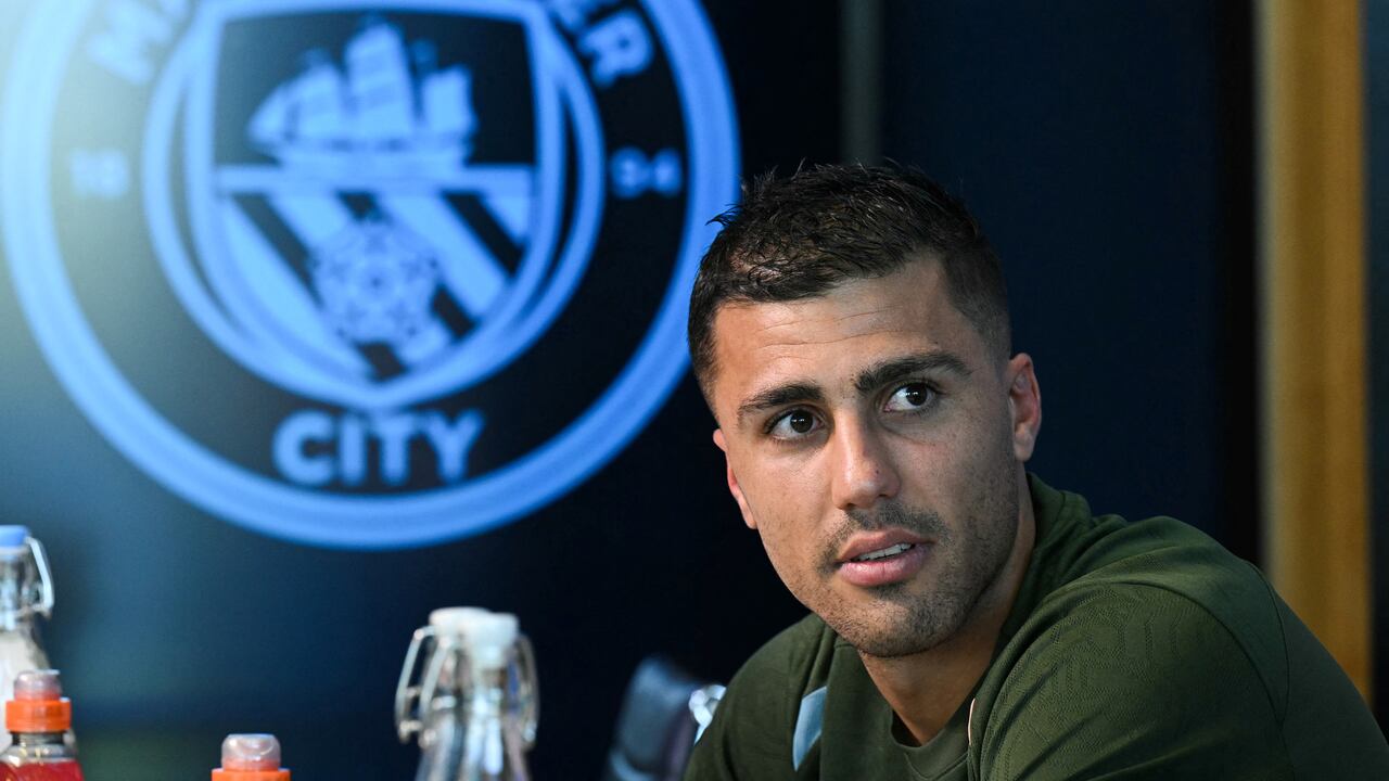 Manchester City's Spanish midfielder #16 Rodri reacts during a press conference at the Manchester City's training ground, in Manchester, north-west England, on September 17, 2024, on the eve of their UEFA Champions League football match against Inter Milan. (Photo by Oli SCARFF / AFP)