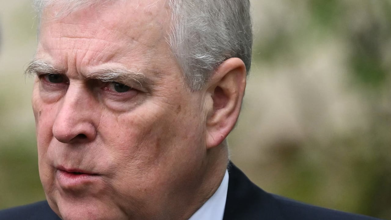 (FILES) Britain's Prince Andrew, Duke of York reacts as he leaves St. George's Chapel, in Windsor Castle, after attending the Easter Mattins Service, on March 31, 2024. UK police announced on Thursday 19, 2026, the arrest of ex-prince Andrew on suspicion of misconduct. (Photo by JUSTIN TALLIS / AFP)