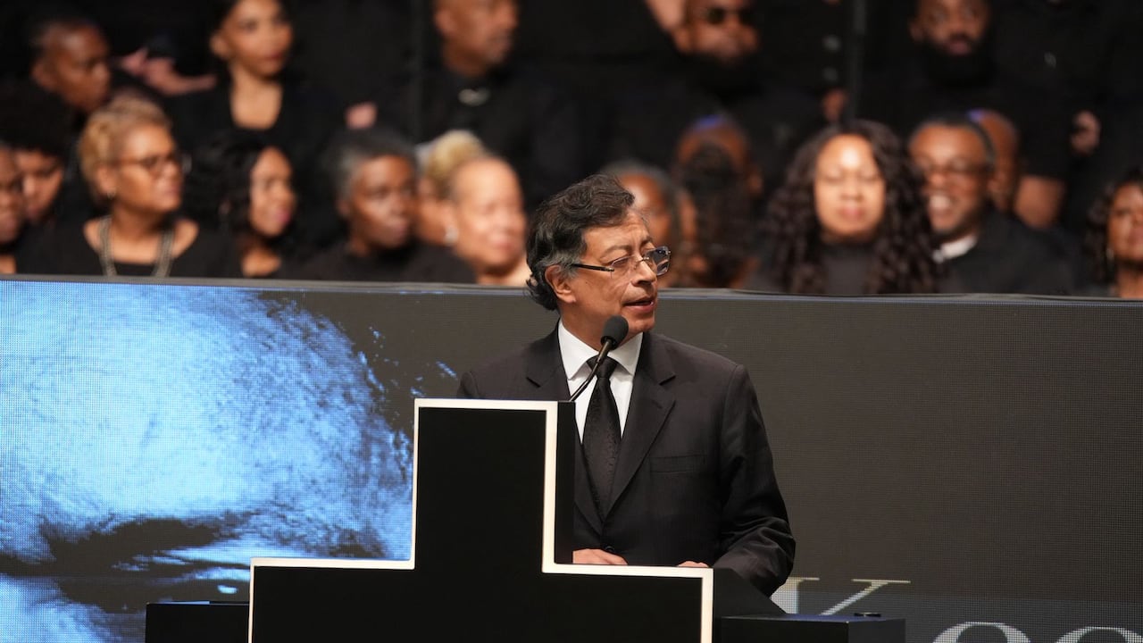 El presidente colombiano participó en el acto fúnebre del líder de derechos civiles en Chicago.