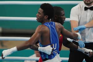 El estadounidense Roscoe Hill venció al colombiano Yuberjen Martinez, en los cuartos de final de los Juegos Panamericanos Chile 2023. /Foto AP/Dolores Ochoa