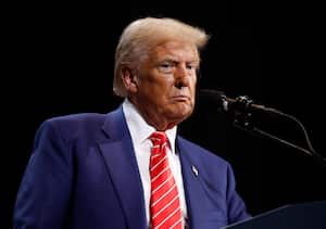 ATLANTA, GEORGIA - OCTOBER 15: Republican presidential nominee, former U.S. President Donald Trump delivers remarks during a campaign rally at the Cobb Energy Performing Arts Centre on October 15, 2024 in Atlanta, Georgia. With early voting starting today in Georgia both Trump and Democratic presidential nominee, Vice President Kamala Harris are campaigning in the Atlanta region this week as polls show a tight race. (Photo by Kevin Dietsch/Getty Images)
