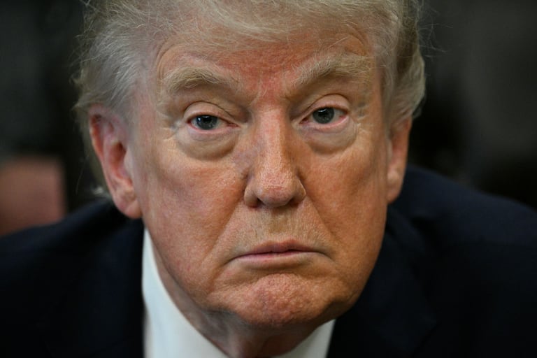 US President Donald Trump speaks after signing an executive order in the Oval Office of the White House in Washington, DC on April 18, 2026. The executive order aims to further US federal medical research and clinical trials for certain psychedelic drugs.certain psychedelic drugs. (Photo by Jim WATSON / AFP)