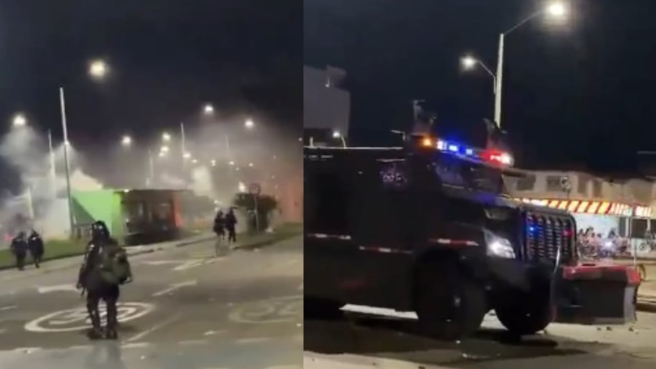 Agentes de la Unidad del Diálogo y Mantenimiento del Orden (UNDMO) controlan disturbios en Puerto Rellena, Cali.