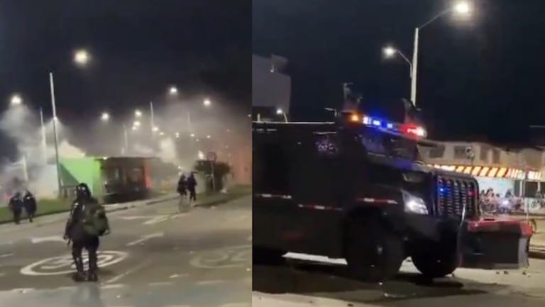 Agentes de la Unidad del Diálogo y Mantenimiento del Orden (UNDMO) controlan disturbios en Puerto Rellena, Cali.