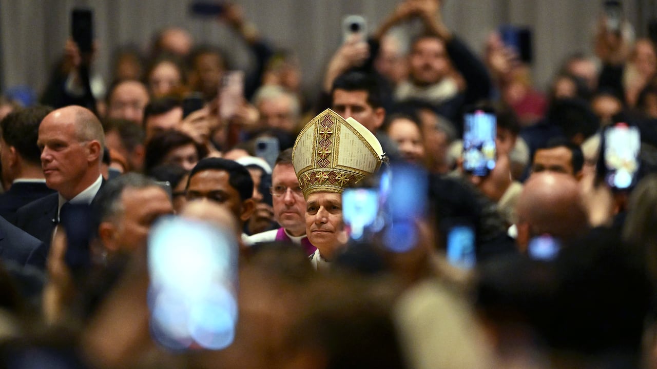 Pope Leo XIV arrives to lead the hristmas Eve mass at St Peter's Basilica in the Vatican on December 24, 2025. (Photo by Andreas SOLARO / AFP)
