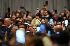 Pope Leo XIV arrives to lead the hristmas Eve mass at St Peter's Basilica in the Vatican on December 24, 2025. (Photo by Andreas SOLARO / AFP)