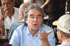 Sergio Fajardo y Jorge Robledo, en campaña por Cali, Panaderia Kuty.