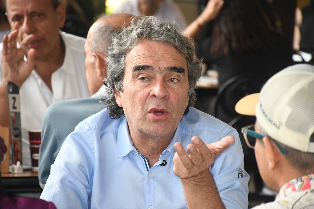 Sergio Fajardo y Jorge Robledo, en campaña por Cali, Panaderia Kuty.