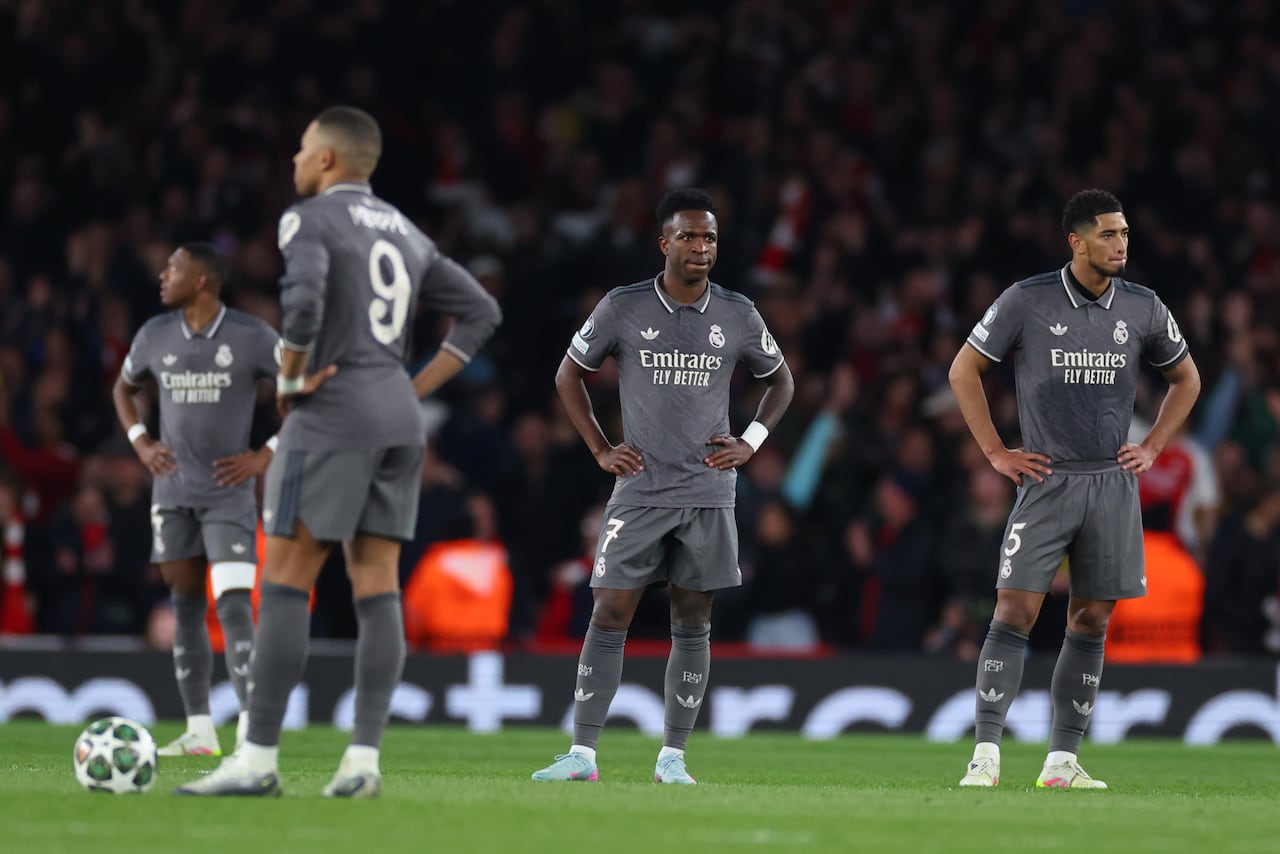 ONDON, ENGLAND - APRIL 8: Kylian Mbappe, Vinicius Junior and Jude Bellingham of Real Madrid look dejected after the third Arsenal goal during the UEFA Champions League 2024/25 Quarter Final First Leg match between Arsenal FC and Real Madrid C.F. at Arsenal Stadium on April 8, 2025 in London, England. (Photo by Marc Atkins/Getty Images)