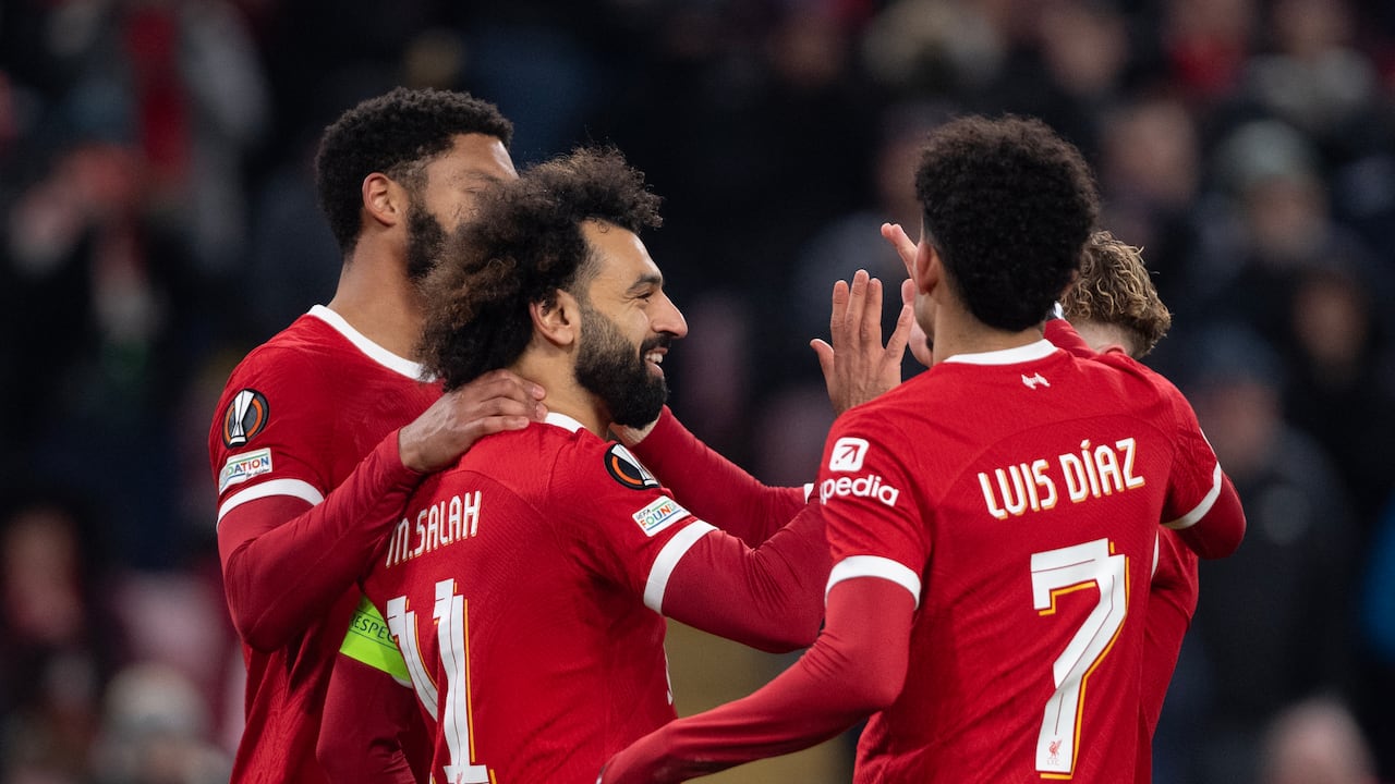 LIVERPOOL, ENGLAND - NOVEMBER 30: Mohamed Salah of Liverpool celebrates scoring his team's fourth goal with team mates Luis Diaz (obscured), Joe Gomez (obscured) and Harvey Elliott (obscured) during the UEFA Europa League Group E between Liverpool FC v LASK at Anfield on November 30, 2023 in Liverpool, England. (Photo by Joe Prior/Visionhaus via Getty Images)