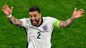 England's defender #02 Kyle Walker celebrates at the end of the UEFA Euro 2024 semi-final football match between the Netherlands and England at the BVB Stadion in Dortmund on July 10, 2024. (Photo by INA FASSBENDER / AFP)