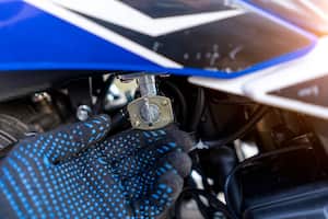 motorcycle fuel tap close-up macro photo.