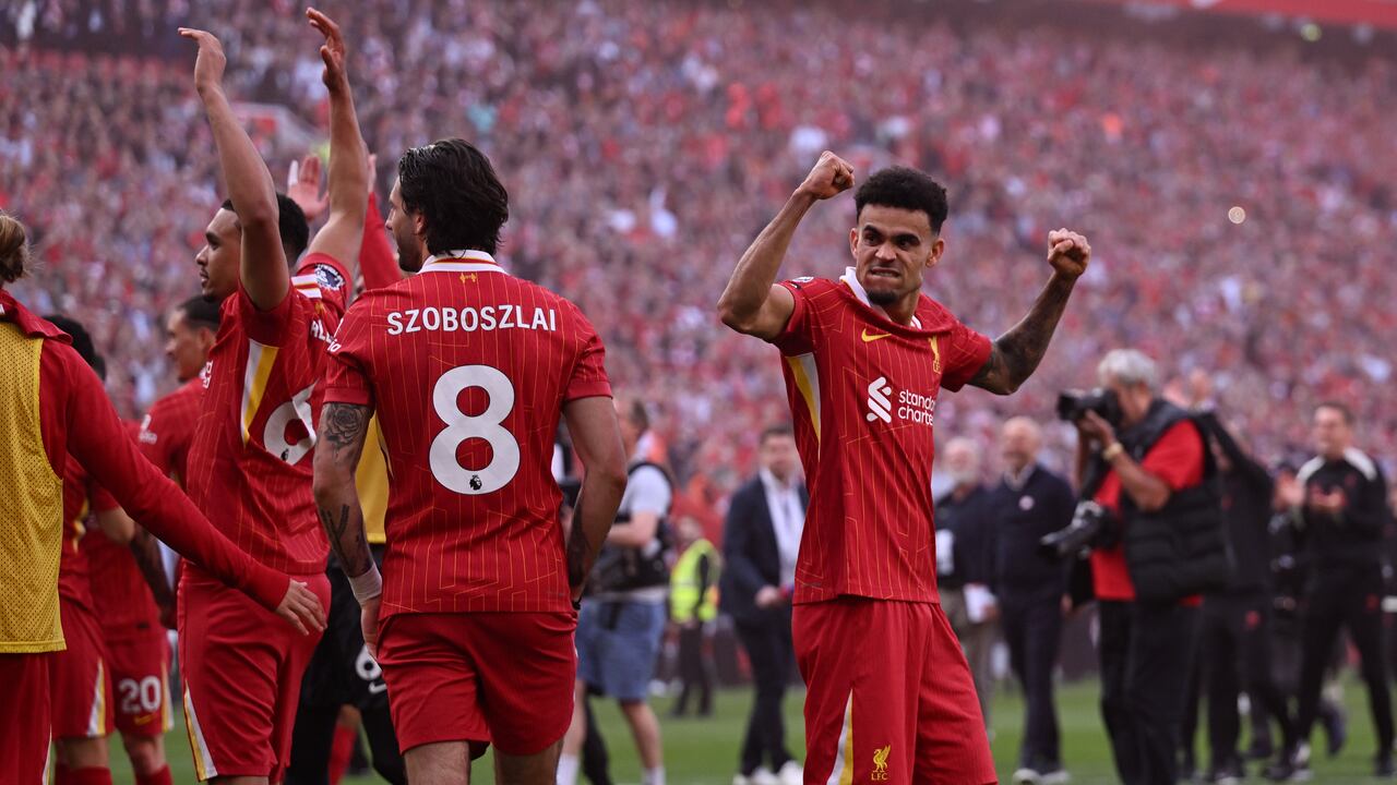LIVERPOOL, ENGLAND - APRIL 27: (THE SUN OUT, THE SUN ON SUNDAY OUT) Luis Diaz of Liverpool celebrating after being named champions of the Premier League at the end of the Premier League match between Liverpool FC and Tottenham Hotspur FC at Anfield on April 27, 2025 in Liverpool, England. (Photo by Andrew Powell/Liverpool FC via Getty Images)