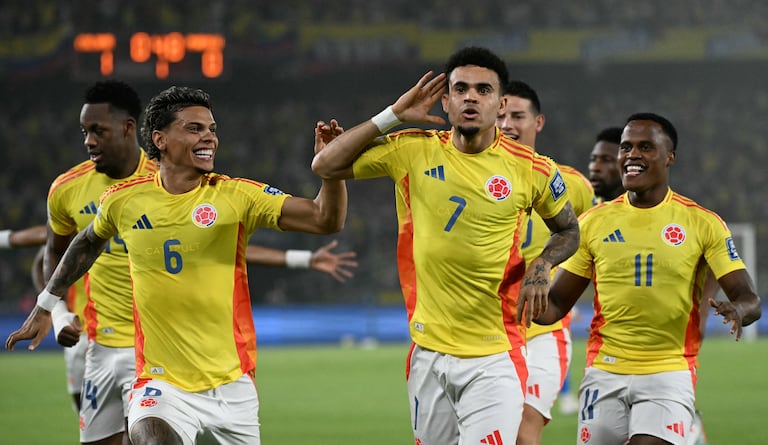Colombia's forward #07 Luis Diaz (2nd-R) celebrates with teammates midfielder #06 Richard Rios and forward #11 Jhon Arias after scoring his team first goal during the 2026 FIFA World Cup South American qualifiers football match between Colombia and Paraguay at the Metropolitano Roberto Melendez stadium in Barranquilla, Colombia, on March 25, 2025. (Photo by Luis ACOSTA / AFP)