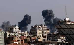 Smoke billows from Israeli air strikes in the Gaza Strip, controlled by the Palestinian Islamist movement Hamas, on May 11, 2021. - Israel and Hamas exchanged heavy fire, in a dramatic escalation between the bitter foes sparked by unrest at Jerusalem's flashpoint Al-Aqsa Mosque compound. (Photo by MAHMUD HAMS / AFP)