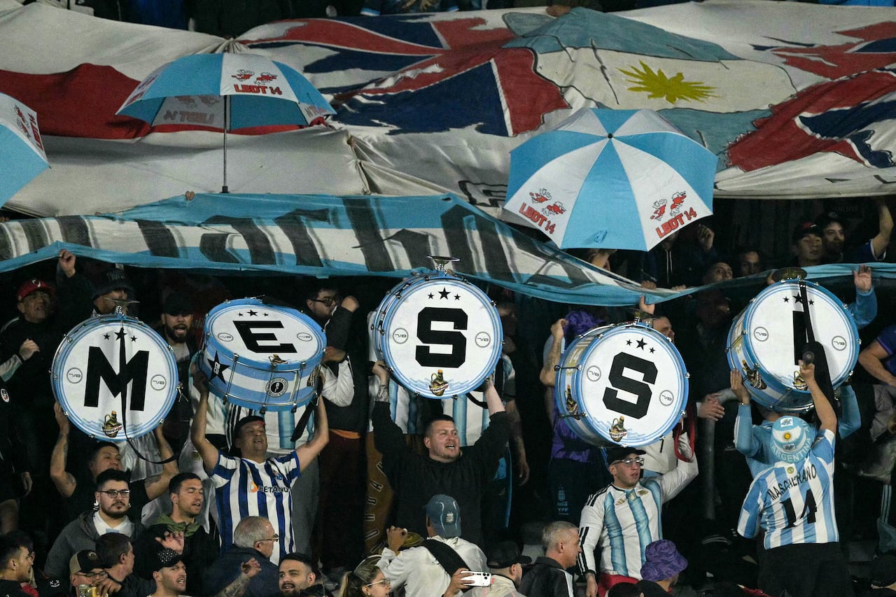 Argentine fans show drums spelling out "Messi" during the international friendly football match between Argentina and Burkina Faso at the Mas Monumental stadium in Buenos Aires on October 3, 2026. (Photo by JUAN MABROMATA / AFP)
