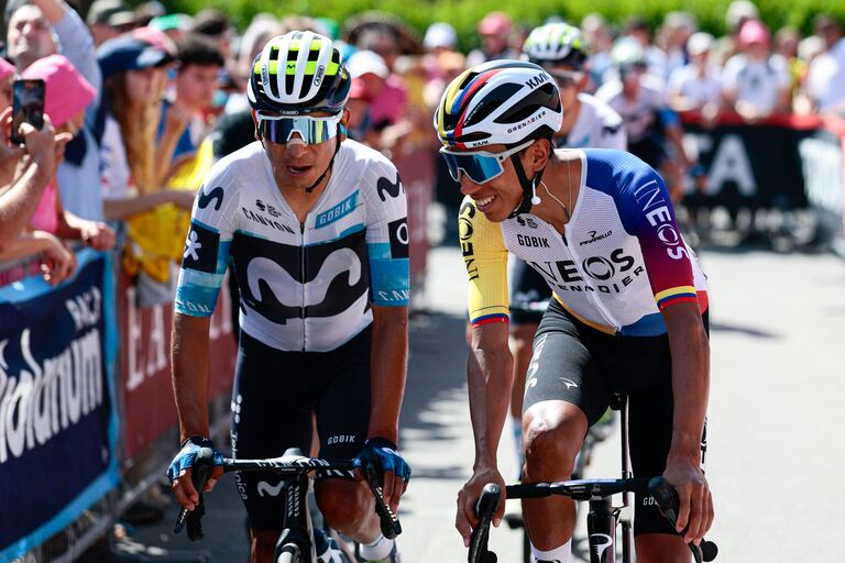 Ineos Grenadiers' Colombian rider Egan Bernal (R) and Movistar Team's Colombian rider Nairo Quintana react ahead of the start of the 20th stage of the 108th Giro d'Italia cycling race 205kms from Verres to Sestriere on May 31, 2025. (Photo by Luca Bettini / AFP)