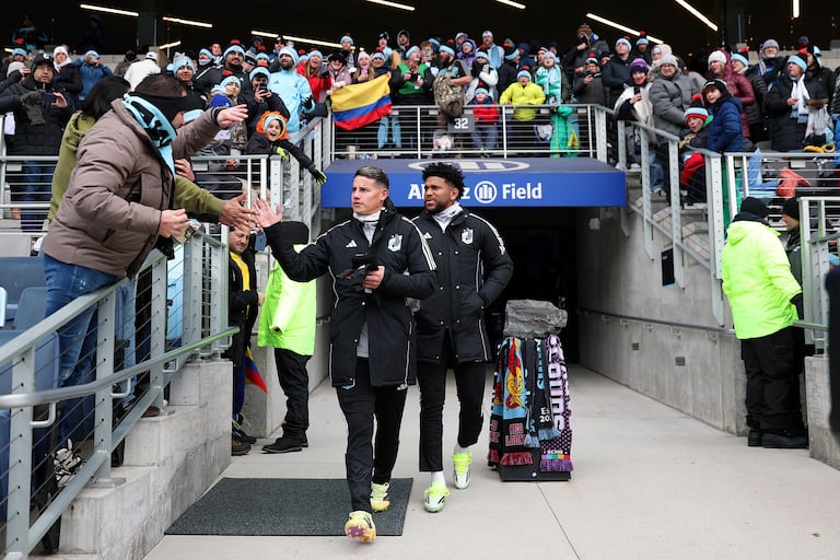ST PAUL, MINNESOTA - FEBRUARY 28: James Rodr�guez #10 of Minnesota United greets fans as he walks onto the pitch with teammate Carlos Harvey #67 prior to the start of the match against FC Cincinnati at Allianz Field on February 28, 2026 in St Paul, Minnesota. David Berding/Getty Images/AFP (Photo by David Berding / GETTY IMAGES NORTH AMERICA / Getty Images via AFP)
