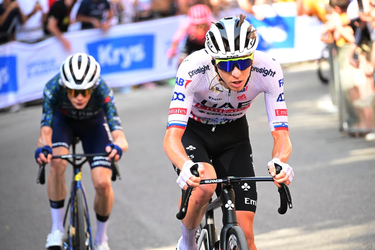 BOLOGNA, ITALY - JUNE 30: (L-R) Jonas Vingegaard Hansen of Denmark and Team Visma | Lease a Bike and Tadej Pogacar of Slovenia and UAE Team Emirates attack in the chase group during the 111th Tour de France 2024, Stage 2 a 199.2km stage from Cesenatico to Bologna / #UCIWT / on June 30, 2024 in Bologna, Italy. (Photo by Bernard Papon - Pool/Getty Images)