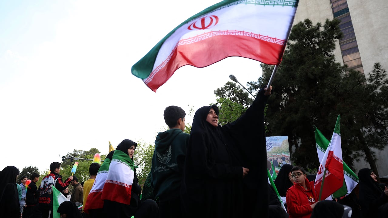 Iranians rally during a memorial, 40 days after a deadly strike on a children�s school in the southern city of Minab on the first day of the war that killed at least 165 people, most of them children, in Tehran on April 7, 2026. On February 28, Israel and the United States launched strikes on Iran, killing its supreme leader and triggering a war that spread across the Middle East. (Photo by AFP) /