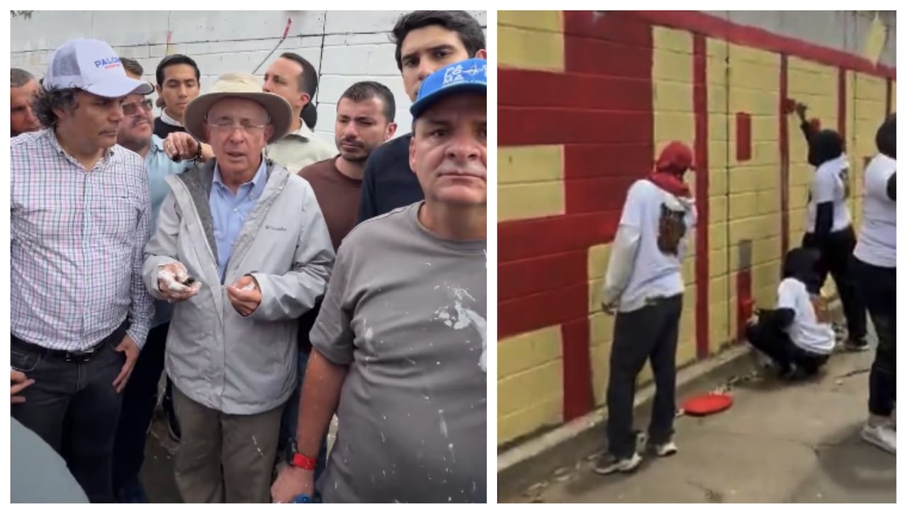 Álvaro Uribe borrando grafiti sobre los falsos positivos pintado cerca de su finca en Llanogrande, Antioquia.