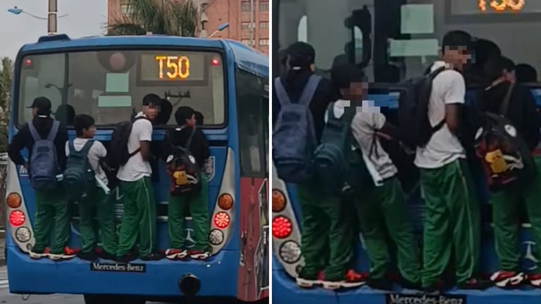 Estudiantes se colgaron de la parte trasera de un MIO sin tener en cuenta el peligro.