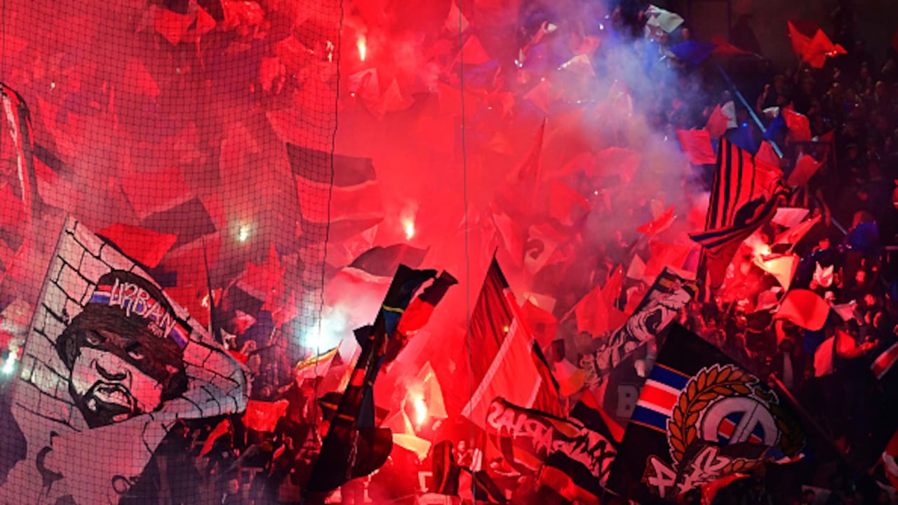 PARIS, FRANCE - OCTOBER 25: Fans of Paris Saint-Germain in action during the UEFA Champions League match between Paris Saint-Germain and AC Milan at Parc des Princes on October 25, 2023 in Paris, France (Photo by Christian Liewig - Corbis/Getty Images)