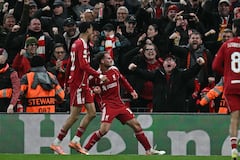 Liverpool's Argentinian midfielder #10 Alexis Mac Allister (C) celebrates after scoring the opening goal of the UEFA Champions League, league phase football match between Liverpool and Real Madrid at Anfield in Liverpool, north west England on November 4, 2025. (Photo by Paul ELLIS / AFP)