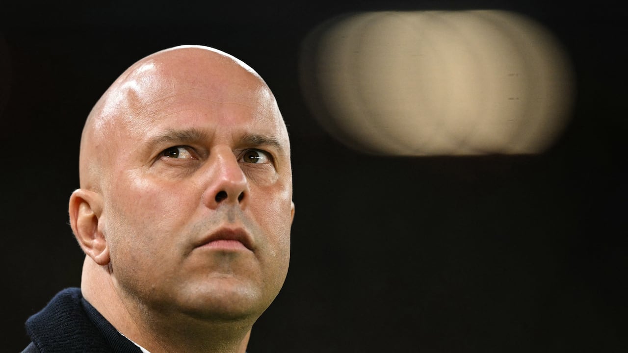 Liverpool's Dutch manager Arne Slot reacts during the last 16 second leg UEFA Champions League football match between Liverpool and Paris Saint-Germain (PSG) at Anfield in Liverpool, north west England on March 11, 2025. (Photo by Oli SCARFF / AFP)