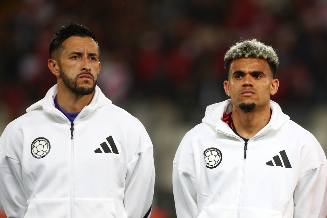 LIMA, PERU - SEPTEMBER 06: (L-R) Camilo Vargas and Luis Diaz of Colombia line up for the national anthem prior to the South American FIFA World Cup 2026 Qualifier match between Peru and Colombia at Estadio Monumental on September 06, 2024 in Lima, Peru. (Photo by Raul Sifuentes/Getty Images)