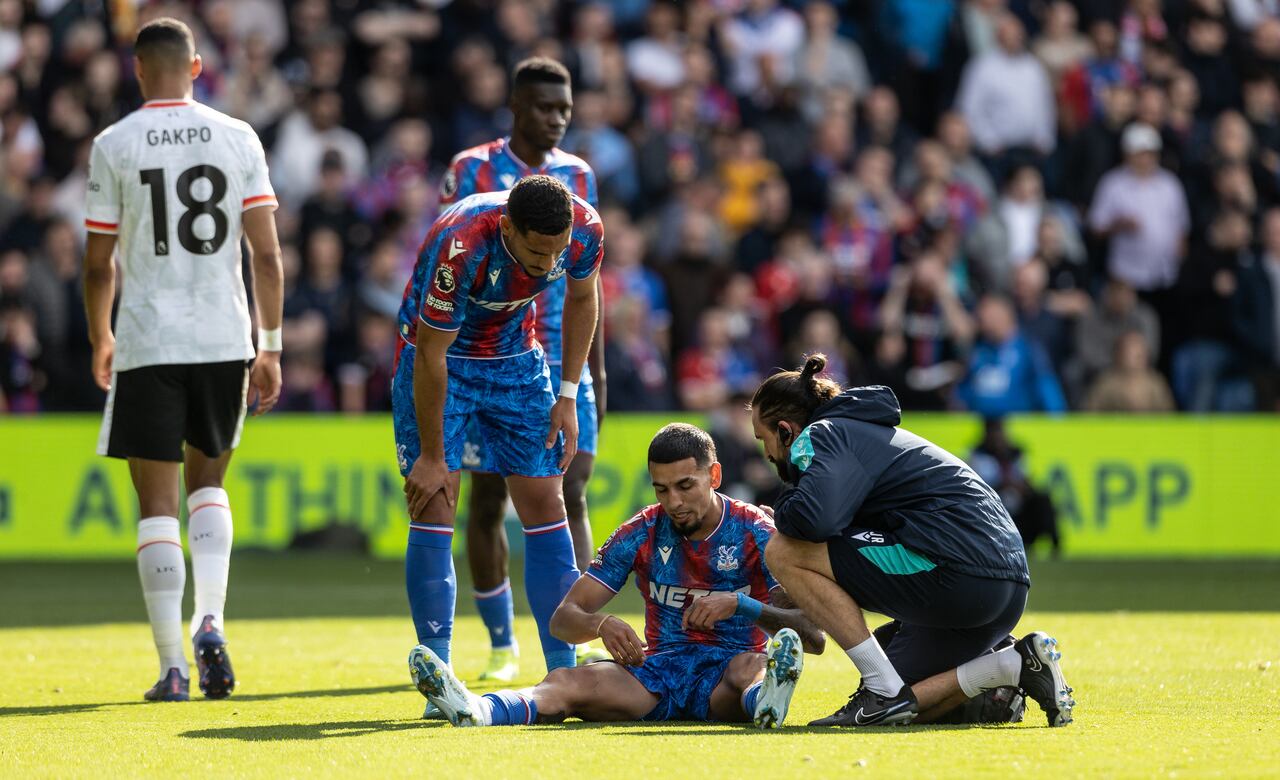 LONDON, ENGLAND - OCTOBER 05: Crystal Palace's Daniel Munoz receives treatment during the Premier League match between Crystal Palace FC and Liverpool FC at Selhurst Park on October 05, 2024 in London, England. (Photo by Andrew Kearns - CameraSport via Getty Images)