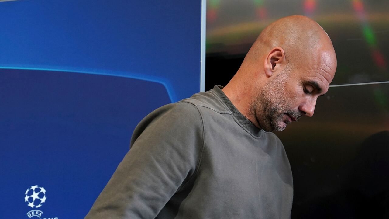 Manchester City manager Pep Guardiola leaves after a press conference ahead of Wednesday's Champions League, semifinal, return-leg soccer match against Real Madrid, at City Football Academy, Manchester, England, Tuesday May 16, 2023. (Martin Rickett/PA via AP)
