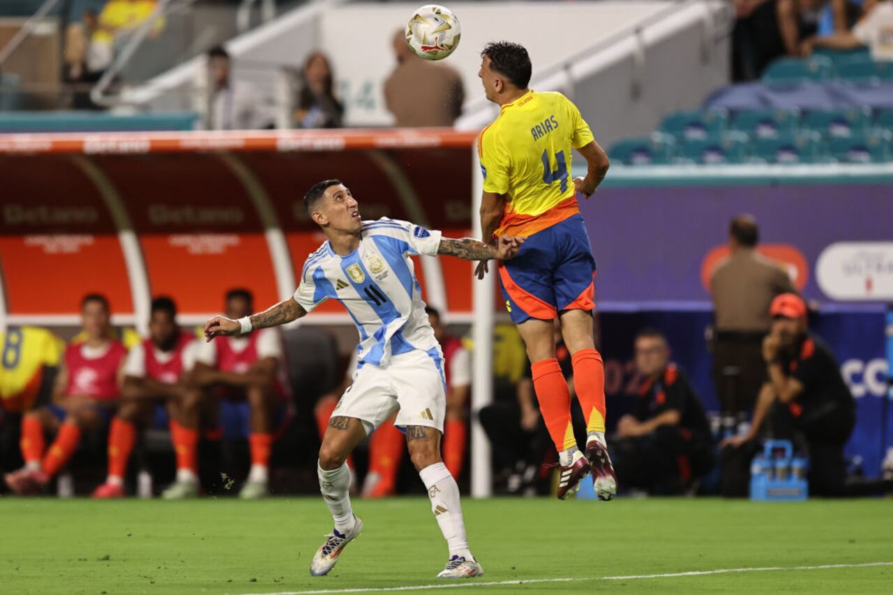 MIAMI GARDENS, FLORIDA - JULY 14: Angel Di Maria of Argentina battles for possession with Santiago Arias of Colombia during the CONMEBOL Copa America 2024 Final match between Argentina and Colombia at Hard Rock Stadium on July 14, 2024 in Miami Gardens, Florida. (Photo by Omar Vega/Getty Images)