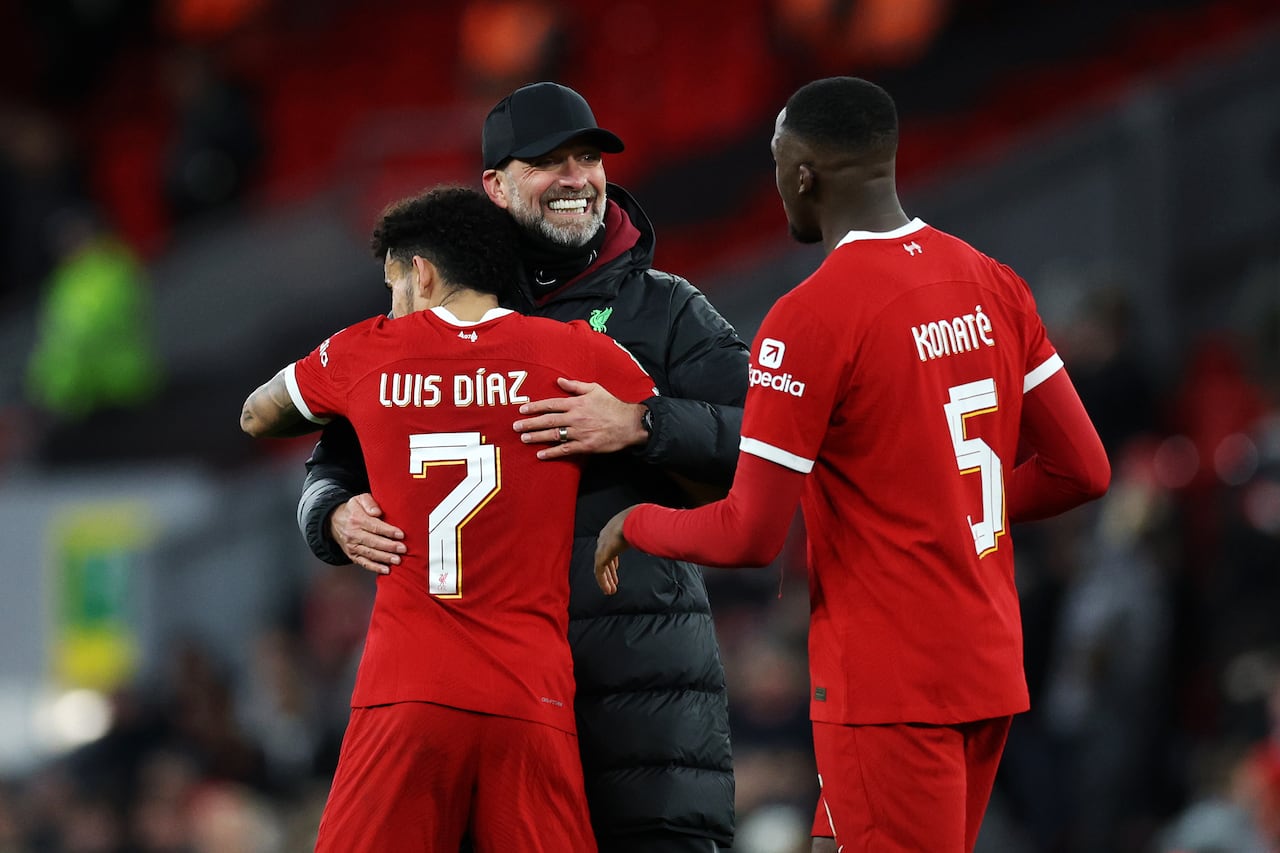 LIVERPOOL, ENGLAND - JANUARY 10: Juergen Klopp, Manager of Liverpool, Luis Diaz and Ibrahima Konate of Liverpool celebrate following the team's victory in the Carabao Cup Semi Final First Leg match between Liverpool and Fulham at Anfield on January 10, 2024 in Liverpool, England. (Photo by Clive Brunskill/Getty Images)