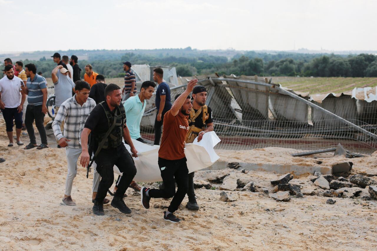 Más de 20 muertos y cientos de heridos dejan hasta el momentos los ataques en Israel. (Photo by BASHAR TALEB / AFP)
