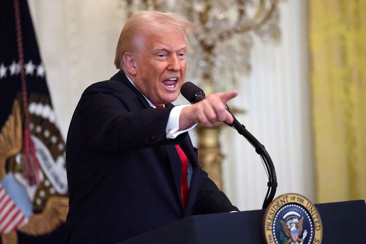 WASHINGTON, DC - MARCH 26: U.S. President Donald Trump gestures while speaking during a Women's History Month event in the East Room of the White House on March 26, 2025 in Washington, DC. President Trump announced the launch of a new caucus named the Republican Women’s Caucus, led by U.S. Rep. Kat Cammack (R-FL). (Photo by Win McNamee/Getty Images)