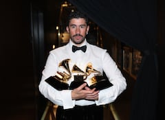 Bad Bunny poses with the Album of the Year, Best M�sica Urbana Album, and Best Global Music Performance Awards during the 68th GRAMMY Awards at Crypto.com Arena on February 01