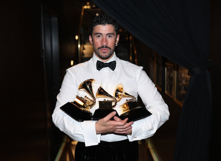 Bad Bunny poses with the Album of the Year, Best M�sica Urbana Album, and Best Global Music Performance Awards during the 68th GRAMMY Awards at Crypto.com Arena on February 01