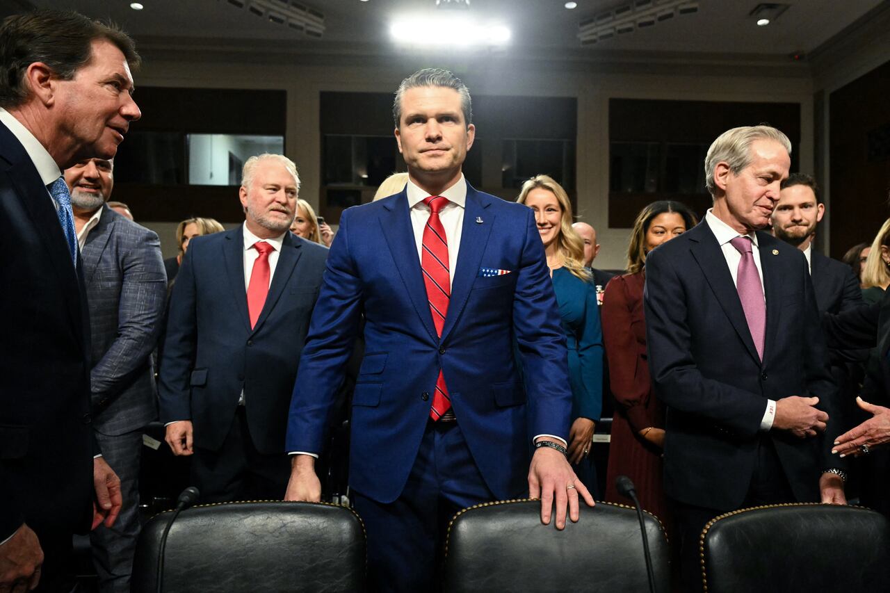 Pete Hegseth (C), US President-elect Donald Trump's nominee for Defense Secretary, arrives for his confirmation hearing before the Senate Armed Services Committee on Capitol Hill on January 14, 2025 in Washington, DC. (Photo by SAUL LOEB / AFP)