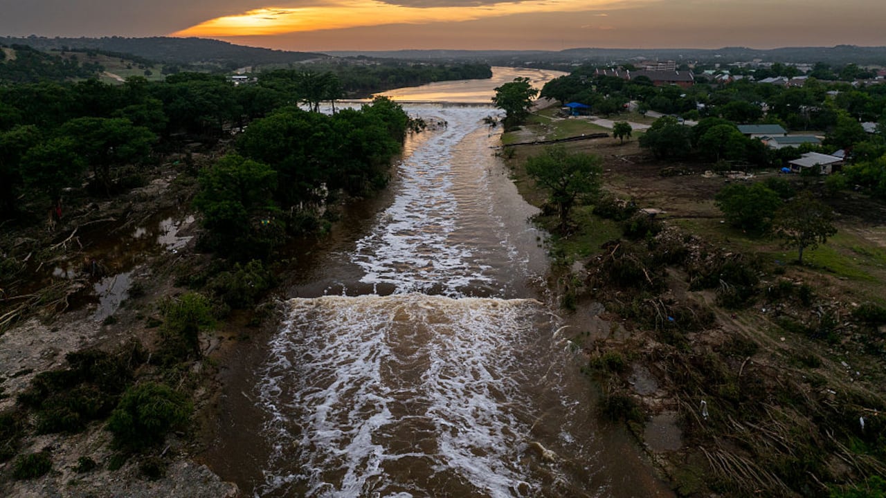 KERRVILLE, TEXAS - JULY 06: In an aerial view, the sun sets over the Guadalupe River on July 06, 2025 in Kerrville, Texas. Heavy rainfall caused severe flooding along the Guadalupe River in central Texas, leaving more than 80 people reported dead. (Photo by Brandon Bell/Getty Images)