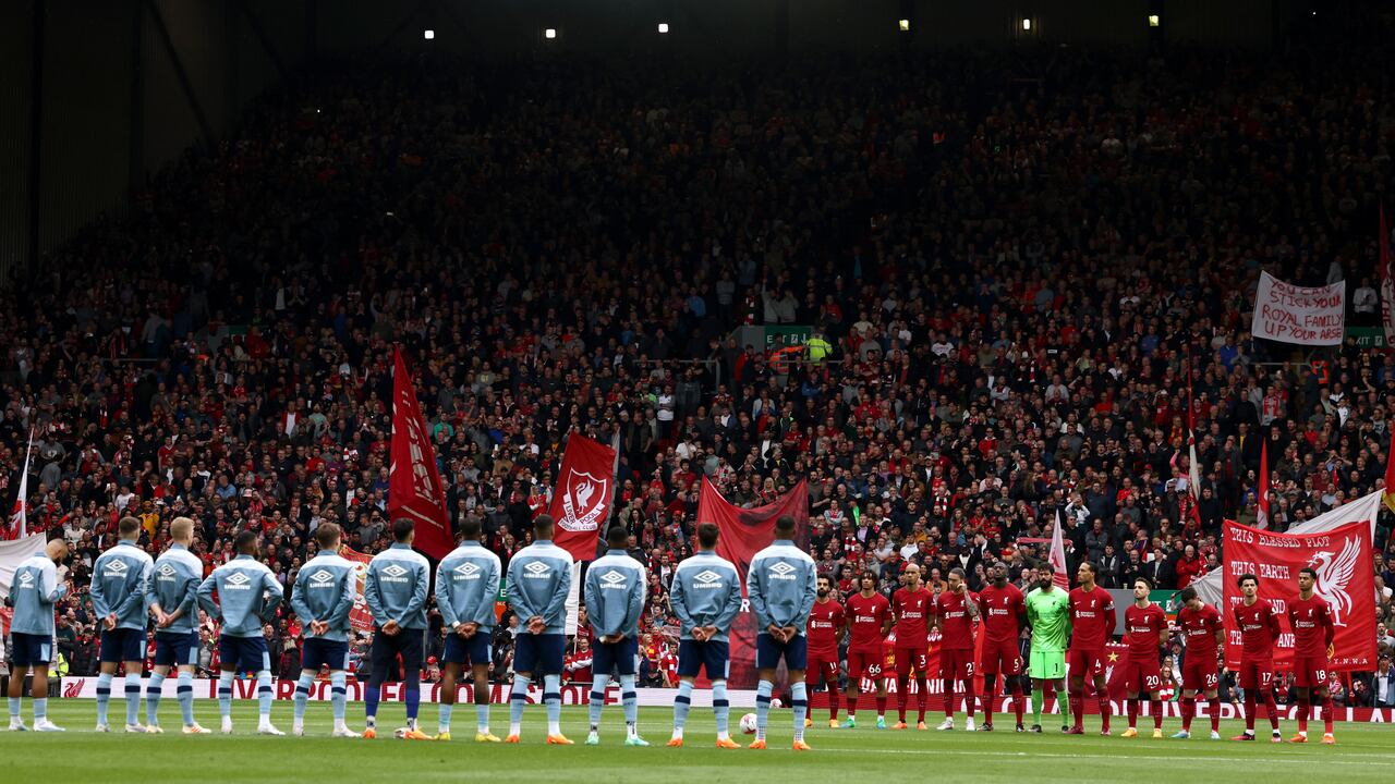Players sing the national anthem prior to the English Premier League football match between Liverpool and Brentford at Anfield in Liverpool, north west England on May 6, 2023. (Photo by Darren Staples / AFP) / RESTRICTED TO EDITORIAL USE. No use with unauthorized audio, video, data, fixture lists, club/league logos or 'live' services. Online in-match use limited to 120 images. An additional 40 images may be used in extra time. No video emulation. Social media in-match use limited to 120 images. An additional 40 images may be used in extra time. No use in betting publications, games or single club/league/player publications. /