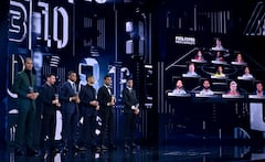 PARIS, FRANCE - FEBRUARY 27: Players included in the FIFA FIFPRO Men's World 11 2022 squad, from left, Virgil van Dijk, Lionel Messi, Kylian Mbappe, Achraf Hakimi, Casemiro and Joao Cancelo with their trophies during The Best FIFA Football Awards 2022 at Salle Pleyel on February 27, 2023 in Paris, France. (Photo by Brendan Moran - FIFA/FIFA via Getty Images)