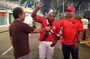 Hincha del América de Cali muestra su felicidad ante la cámara de El País, al asistir por primera vez al Pascual Guerrero