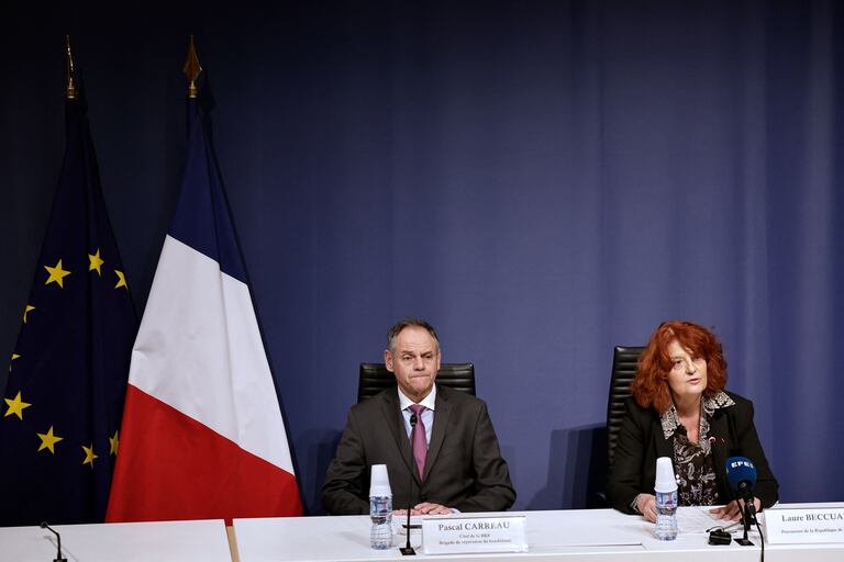 (From L) French police's anti-gang unit BRB (Brigade de Repression du Banditisme) Chief Paul Carreau (L) and  Paris State Prosecutor Laure Beccuau  give a press conference  regarding the opening of a judicial investigation into the Louvre museum jewellry heist, in Paris on October 29, 2025. Two men could face charges on October 29 over the spectacular theft of priceless jewels from the Louvre museum, as a Paris prosecutor promised an update in the case. Dozens of detectives have been on the trail of four thieves who used a cherry-picker truck and cutting gear to break into a first-floor gallery at the world-renowned museum on the morning of October 19, then fled with jewellery estimated to be worth more than $102 million. (Photo by STEPHANE DE SAKUTIN / AFP)