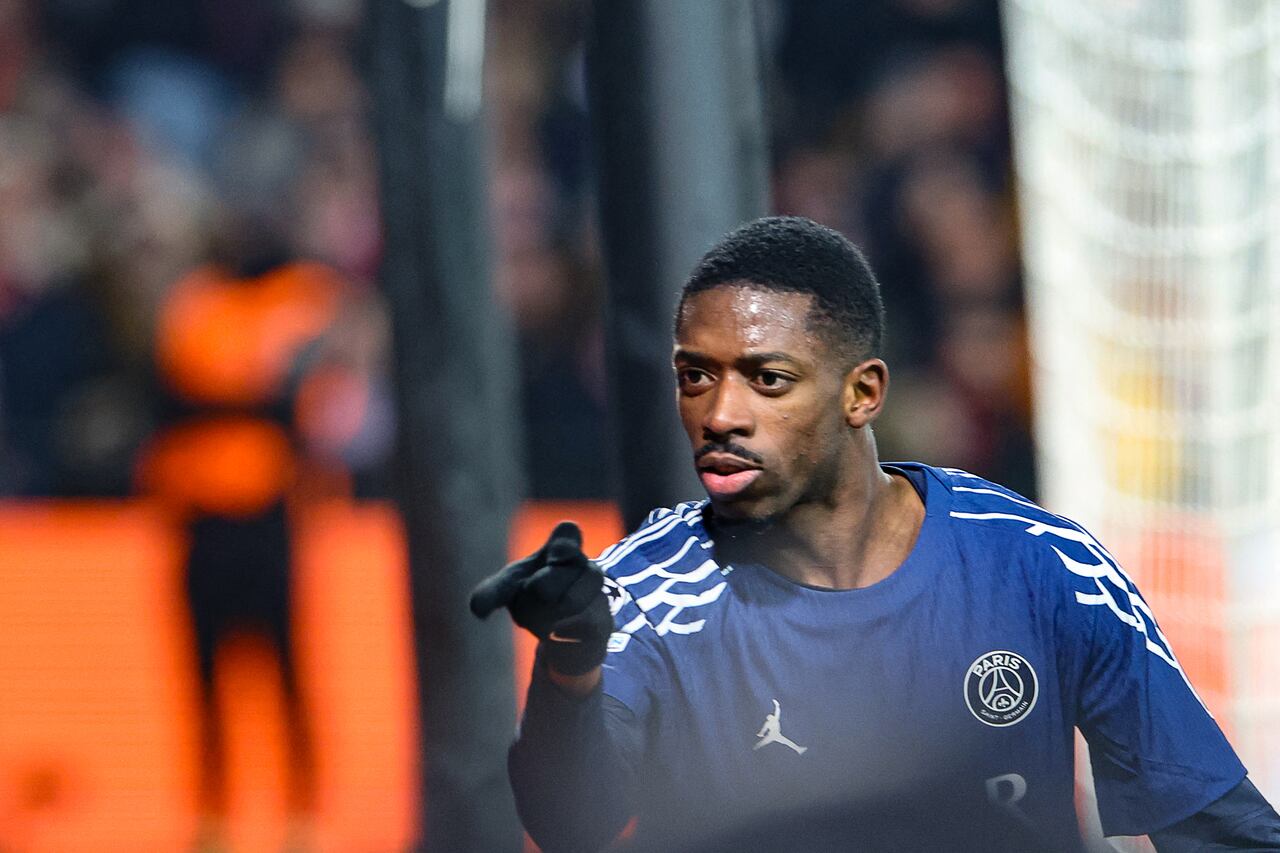 Paris Saint-Germain's French forward #10 Ousmane Dembele celebrates after scoring his team's third goal during the UEFA Champions League knockout phase play-off 1st leg football match between Stade Brestois 29 (Brest) and Paris Saint-Germain (PSG) at the Roudourou Stadium in Guingamp, western France, on February 11, 2025. (Photo by FRED TANNEAU / AFP)