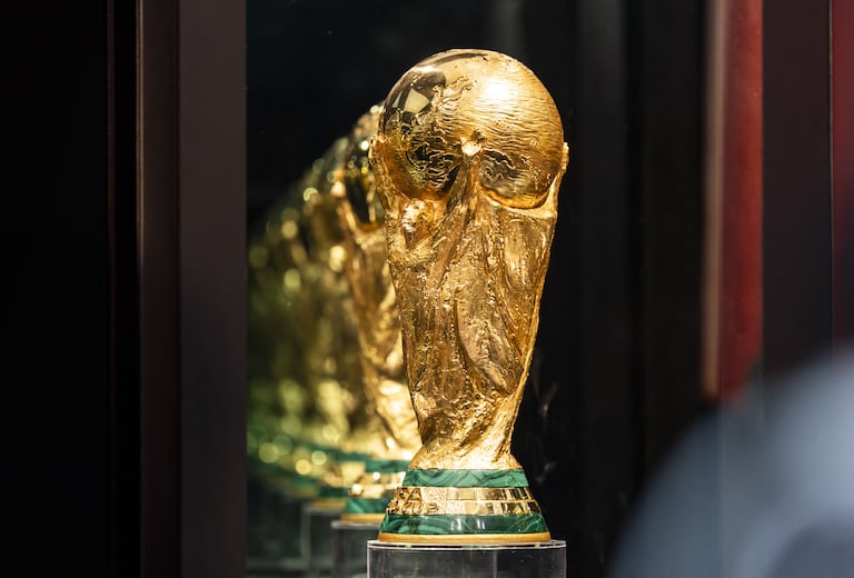 GUWAHATI, INDIA - JANUARY 13: FIFA World Cup Trophy stands on display for public inside a glass box during the Special Trophy Tour on January 13, 2026 in Guwahati, India. Ahead of the FIFA World Cup 2026, which is scheduled to kick off on June 11, the original FIFA World Cup Trophy arrived in India as part of its official global trophy tour. David Talukdar / Anadolu (Photo by David Talukdar / Anadolu via AFP)