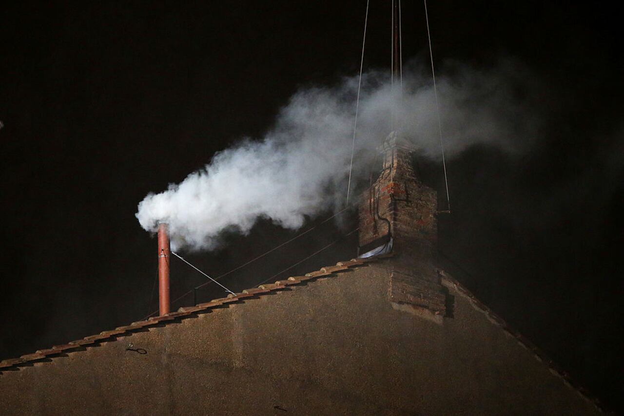 VATICAN CITY, VATICAN - MARCH 13: White smoke billows from the chimney on the roof of the Sistine Chapel indicating that the College of Cardinals have elected a new Pope on March 13, 2013 in Vatican City, Vatican. Pope Benedict XVI's successor - the 266th Pontiff - has been selected by the College of Cardinals in Conclave in the Sistine Chapel. (Photo by Peter Macdiarmid/Getty Images)
