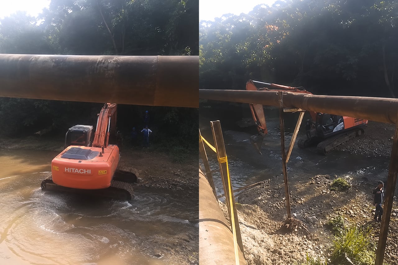 Operarios y maquinaria trabajan en el área de la conducción afectada para permitir la reparación definitiva de la estructura.